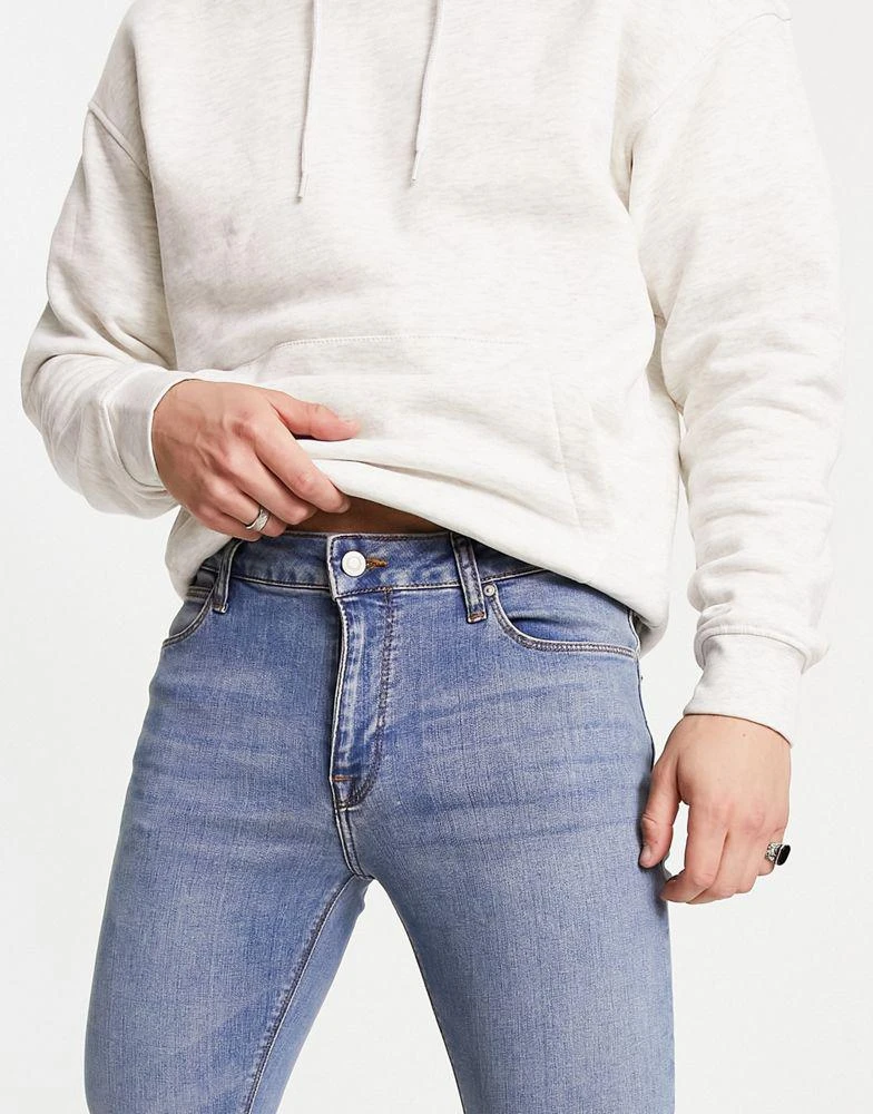 商品ASOS|ASOS DESIGN power stretch jeans in light wash blue,价格¥109,第2张图片详细描述