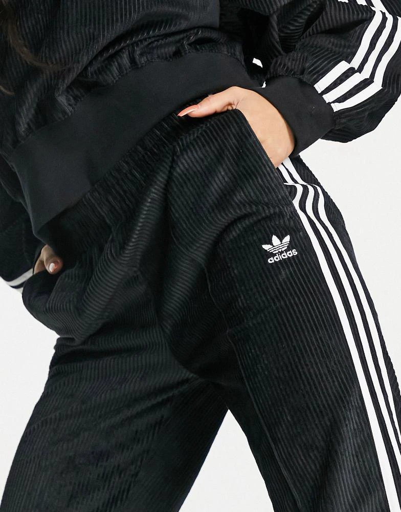 商品Adidas|adidas Originals three stripe corduroy flared trouser in black,价格¥519,第2张图片详细描述