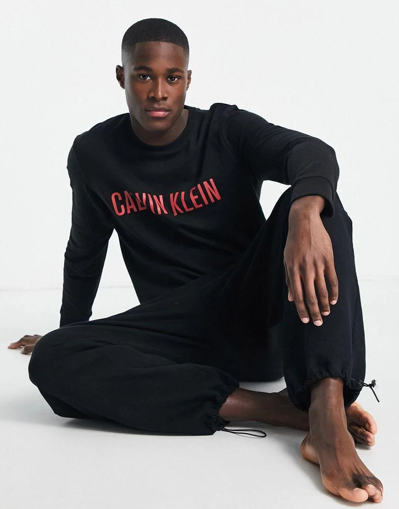 商品Calvin Klein|Calvin Klein Intense Power lounge sweatshirt in black,价格¥234,第1张图片