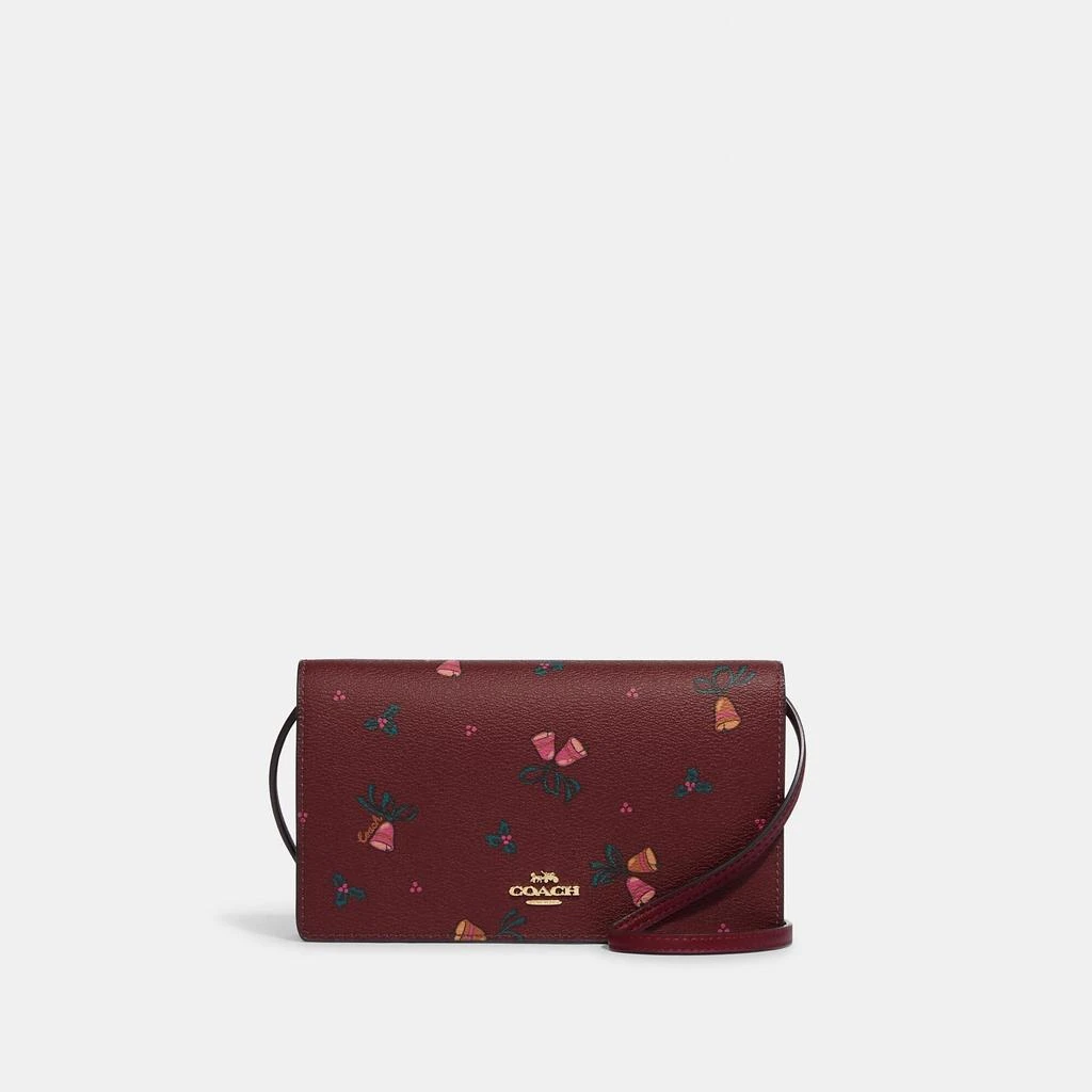 商品Coach|Coach Outlet Anna Foldover Clutch Crossbody With Holiday Bells Print,价格¥608,第1张图片