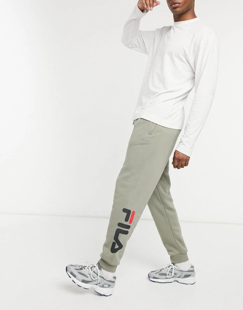 商品Fila|Fila todd logo tapered joggers in beige,价格¥273,第1张图片