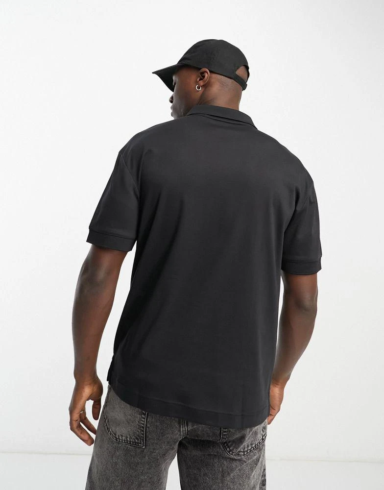 商品Calvin Klein|Calvin Klein open placket polo shirt in black,价格¥725,第2张图片详细描述