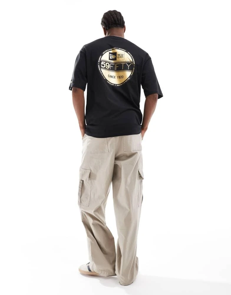 商品New Era|New Era sticker graphic back t-shirt with gold foil in black,价格¥278,第4张图片详细描述