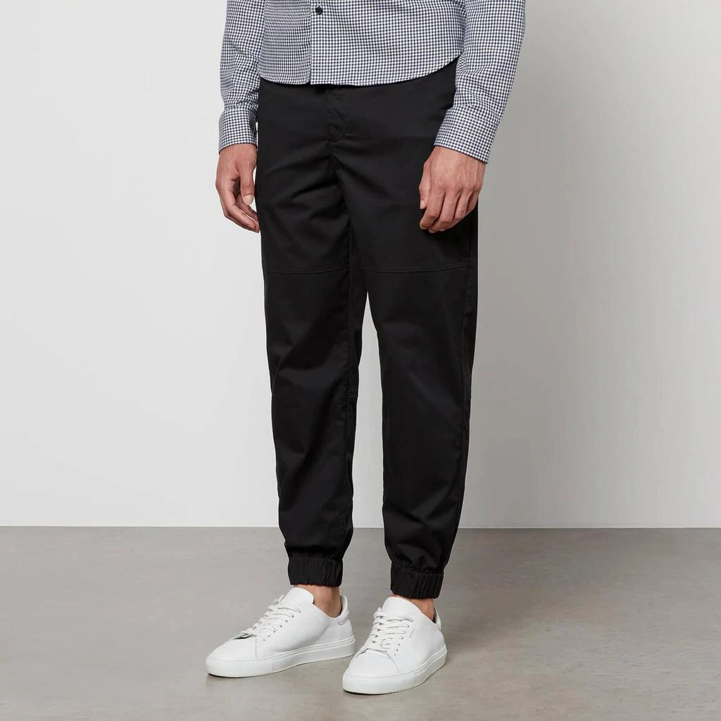 商品Armani Exchange|Armani Exchange Brand Appliqué Cotton-Blend Twill Trousers,价格¥384,第1张图片