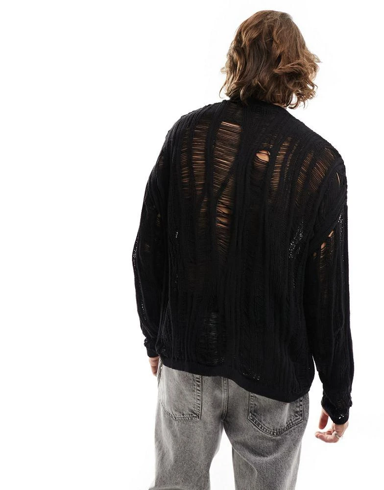 商品ASOS|ASOS DESIGN knitted oversized jumper with distressed ladder detail in black,价格¥181,第2张图片详细描述