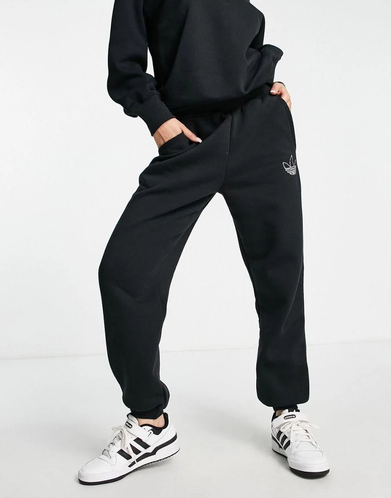 商品Adidas|adidas Originals Mountain Explorer contrast cuffed joggers in black,价格¥416,第1张图片