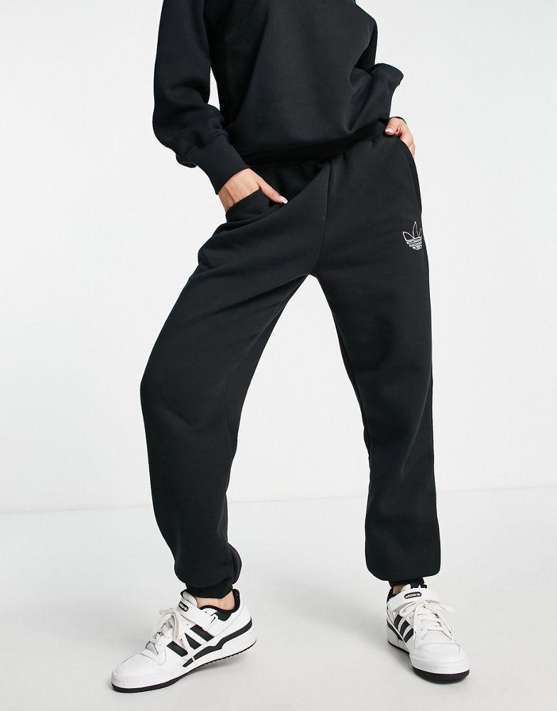 商品Adidas|adidas Originals Mountain Explorer contrast cuffed joggers in black,价格¥534,第1张图片