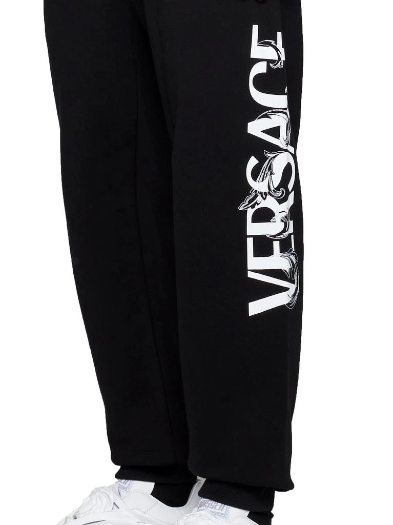 商品Versace|Versace Logo Printed Tapered Track Trousers,价格¥2856-¥3194,第5张图片详细描述