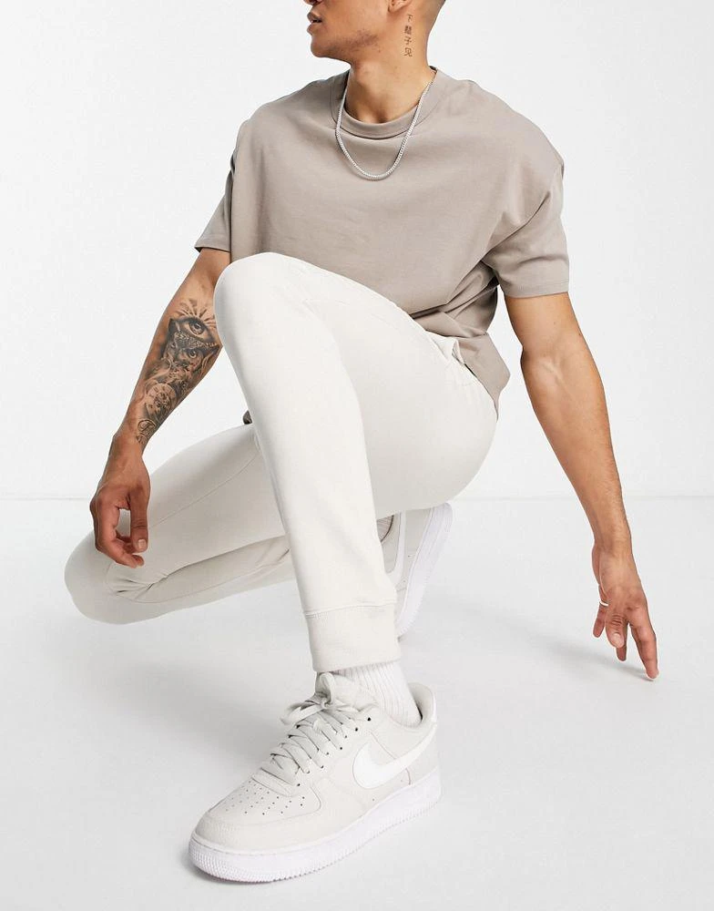 商品CHAMPION|Champion large logo joggers in tan,价格¥206,第3张图片详细描述