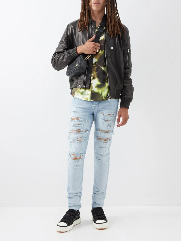 商品AMIRI|Thrasher distressed skinny jeans,价格¥8545,第2张图片详细描述