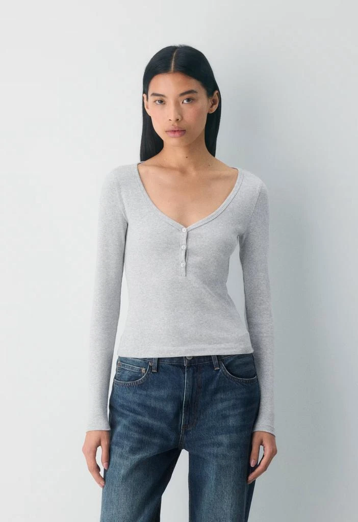 商品Aritzia|Homestretch™ Rib Henley Longsleeve,价格¥289,第2张图片详细描述