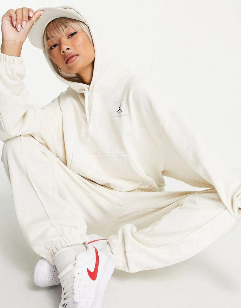 商品Jordan|Jordan essential fleece pull over hoodie in off white,价格¥406,第1张图片