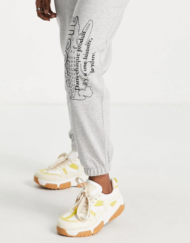 商品Lacoste|Lacoste printed logo joggers in grey,价格¥397,第4张图片详细描述