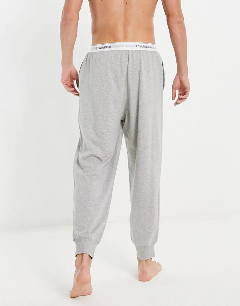 商品Calvin Klein|Calvin Klein lounge jogger in grey with logo waistband,价格¥605,第2张图片详细描述