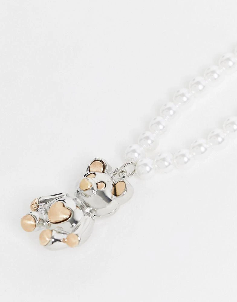 商品ASOS|ASOS DESIGN ball necklace with bi plate teddy pendant in mixed metal,价格¥84,第2张图片详细描述