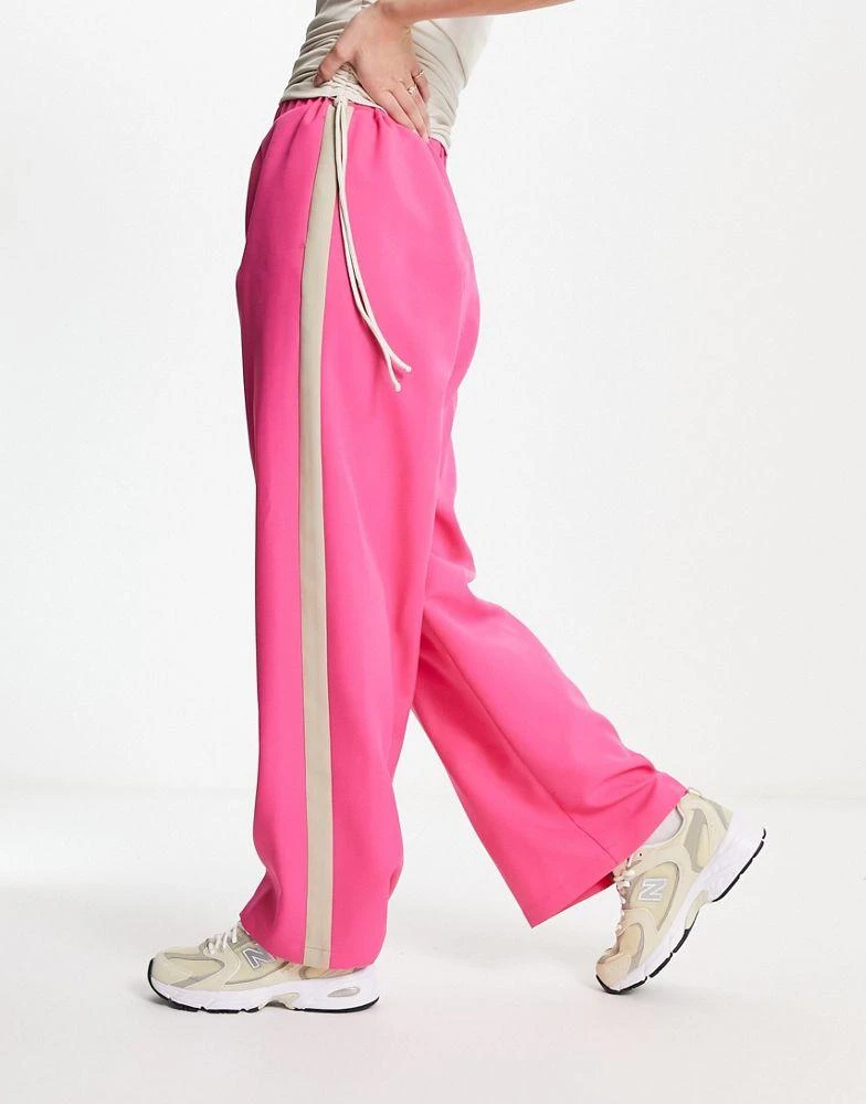 商品ASOS|ASOS DESIGN elastic waist side stripe trouser in pink with stone stripe,价格¥137,第4张图片详细描述