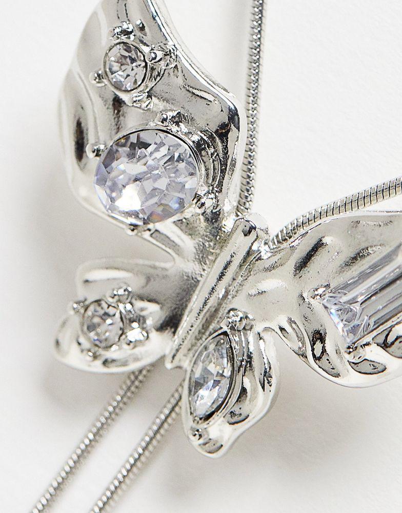 商品Reclaimed Vintage|Reclaimed Vintage laryiat necklace with butterfly pendant in silver,价格¥83,第4张图片详细描述