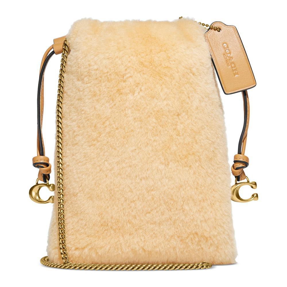 商品Coach|Shearling Drawstring Pouch,价格¥1800,第1张图片