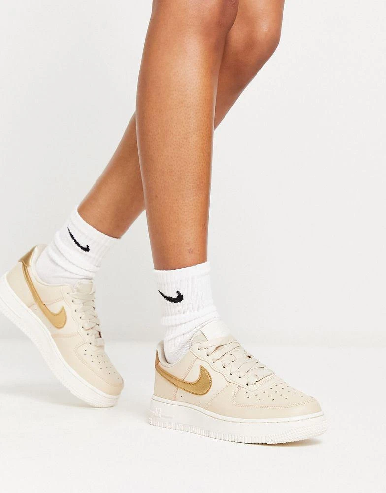 商品NIKE|Nike AF1 '07 trainers in pink and gold metallic,价格¥756,第1张图片
