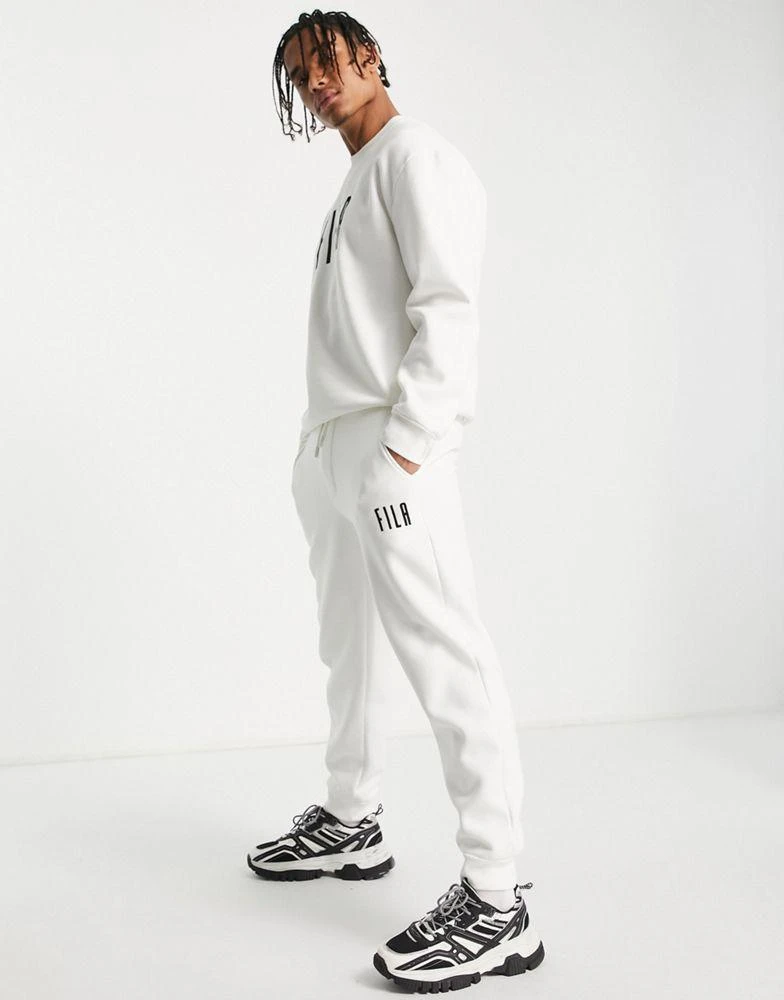 商品Fila|Fila heritage jogger in off white,价格¥231,第1张图片