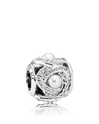 商品PANDORA|Sterling Silver, Crystal & Cubic Zirconia Luminous Love Knot Charm,价格¥341,第1张图片详细描述