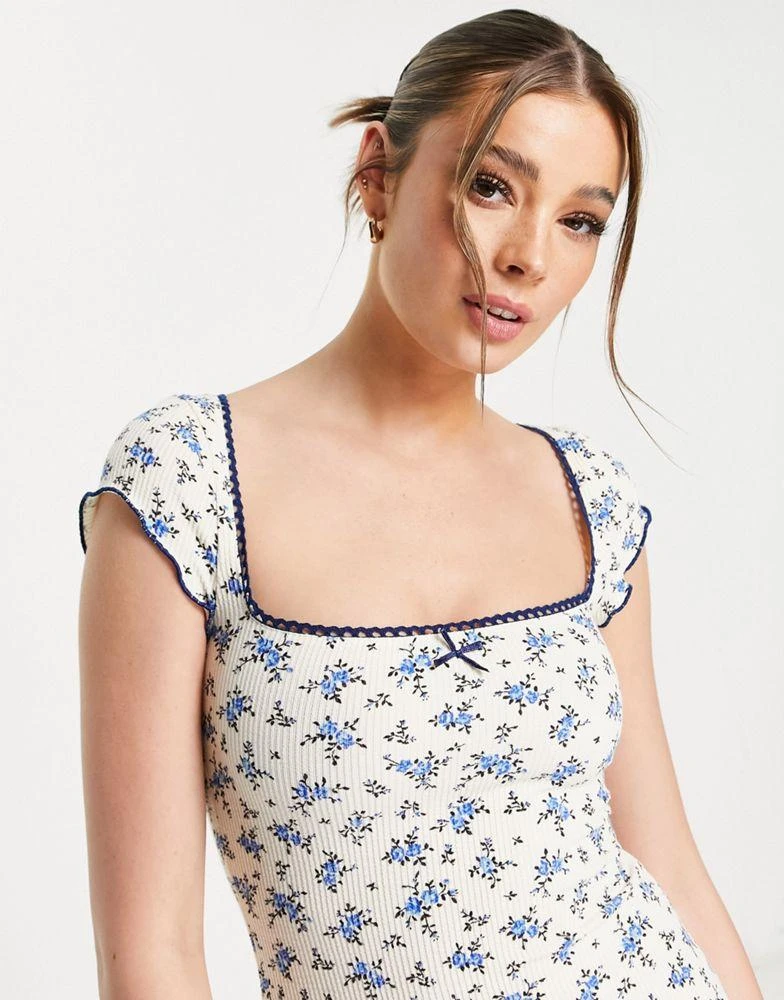商品ASOS|ASOS DESIGN textured mini cap sleeve dress in cream ditsy floral,价格¥169,第3张图片详细描述