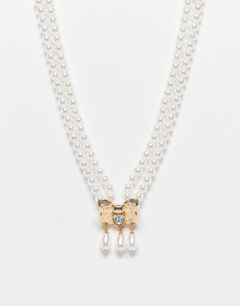 商品Reclaimed Vintage|Reclaimed Vintage pearl necklace with bow drop in gold,价格¥83,第1张图片