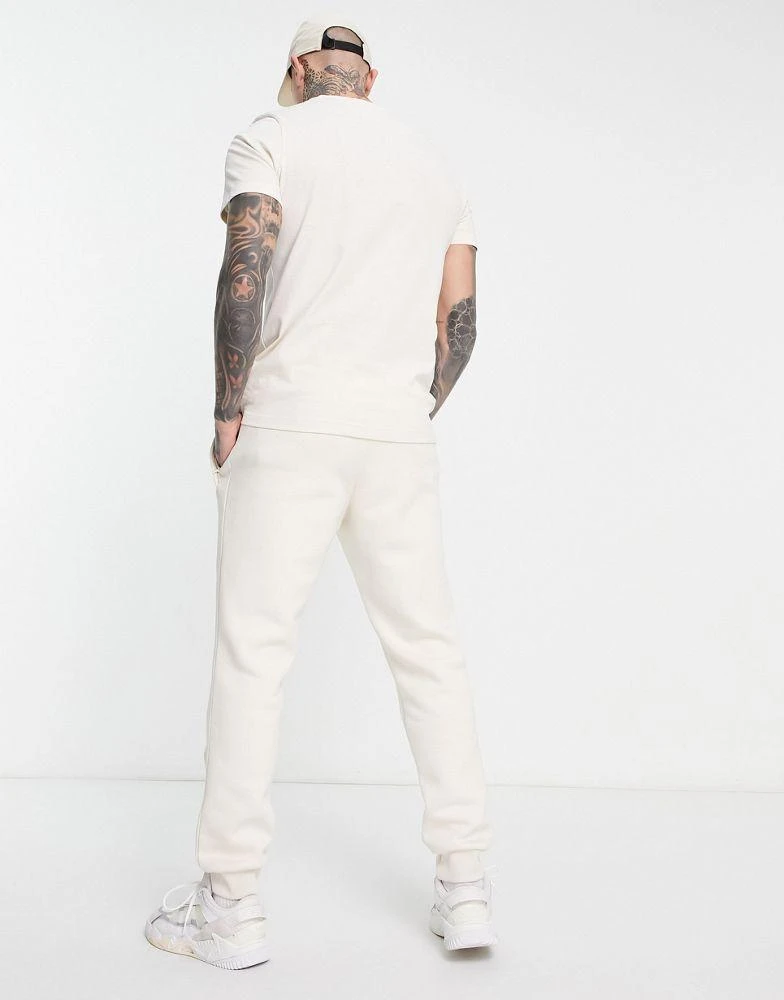 商品Adidas|adidas Originals Trefoil Essentials joggers in white,价格¥494,第4张图片详细描述