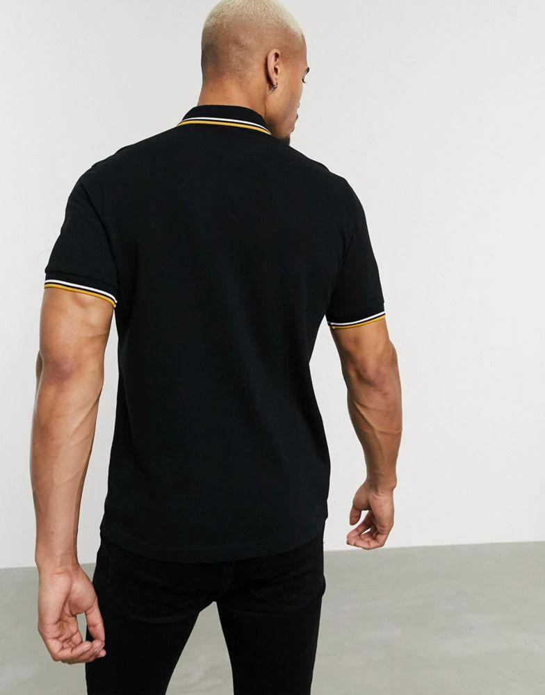 商品Fred Perry|Fred Perry twin tipped logo polo in black/white/gold,价格¥560,第2张图片详细描述