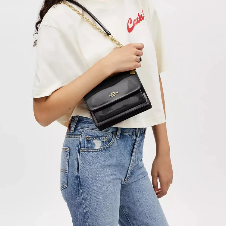 商品[国内直发] Coach|蔻驰 Klare 18 品牌徽标翻盖开合 漆皮拼�光滑皮革 斜挎单肩包 迷你 女款 黑色,价格¥1412,第7张图片详细描述