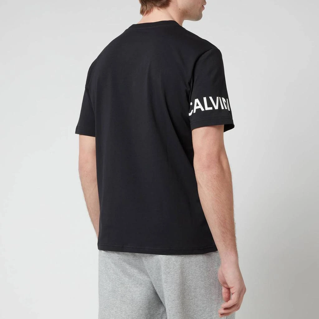 商品Calvin Klein|Calvin Klein Performance Men's Sleeve Logo T-Shirt - Black,价格¥220,第2张图片详细描述