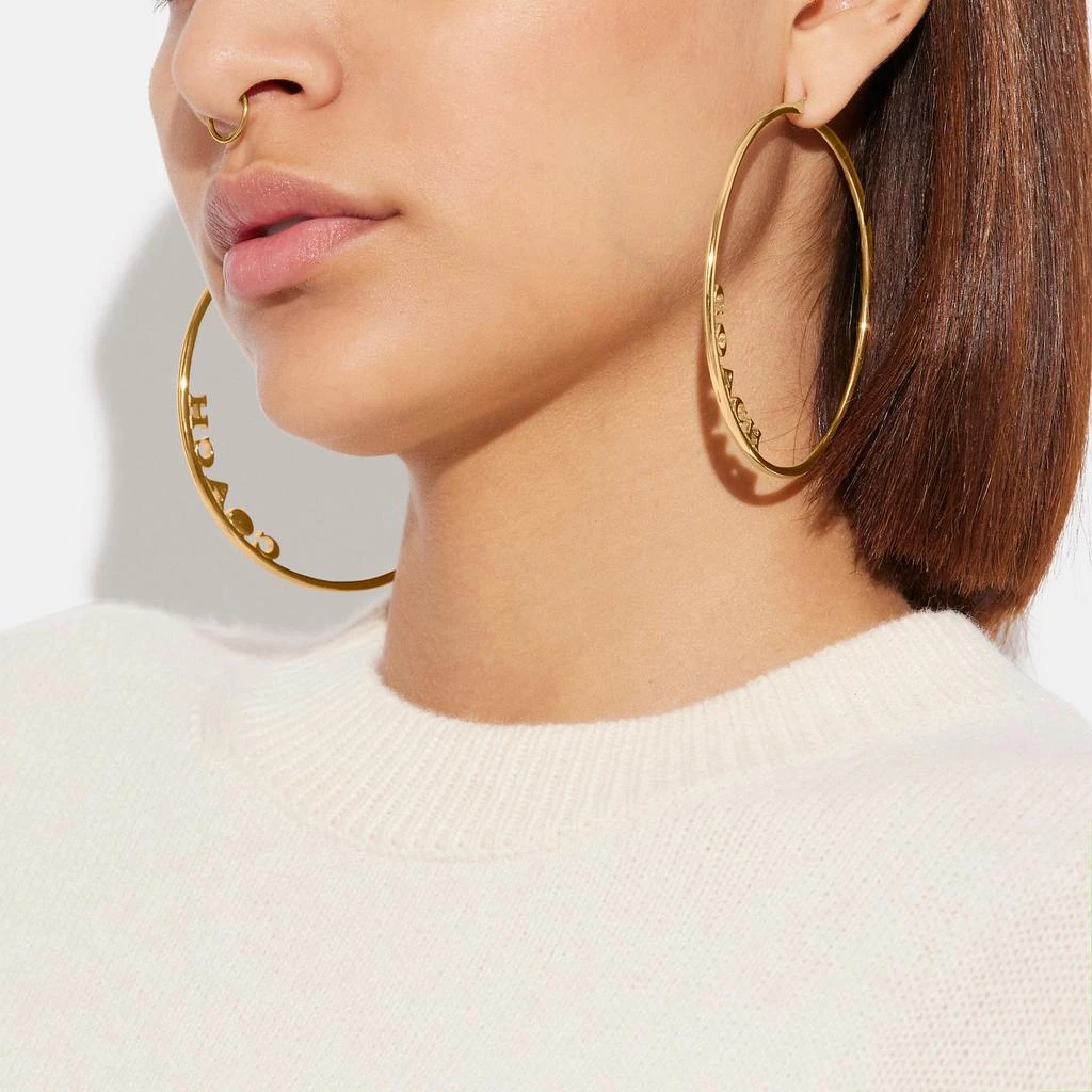 商品Coach|Signature Large Hoop Earrings,价格¥337,第2张图片详细描述