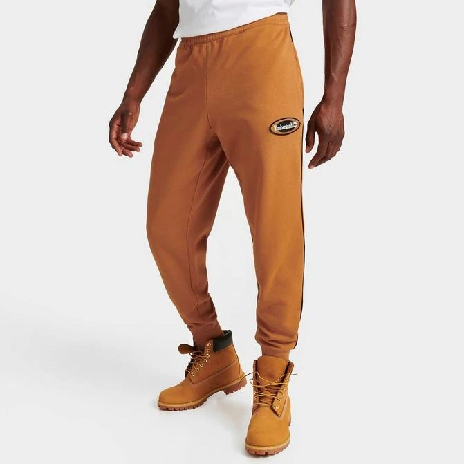 商品Timberland|Men's Timberland Oval Logo Graphic Sweatpants,价格¥299,第1张图片