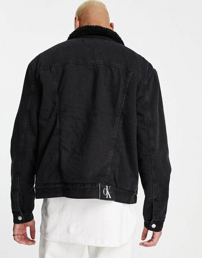 商品Calvin Klein|Calvin Klein Jeans sherpa lined denim jacket in black,价格¥856,第3张图片详细描述