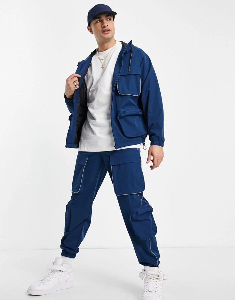 商品Topman|Topman relaxed nylon four pocket co-ord cargo trousers in blue,价格¥245,第4张图片详细描述