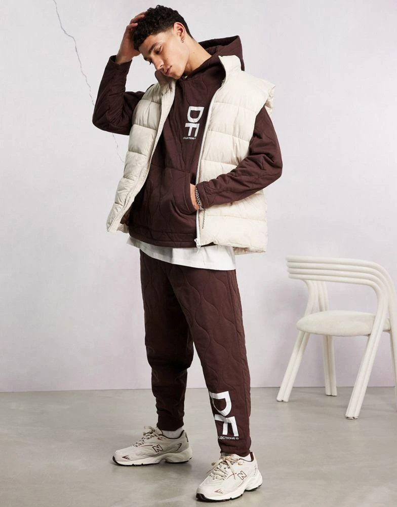 商品ASOS|ASOS Dark Future co-ord relaxed joggers with onion quilting and logo print in brown,价格¥167,第1张图片