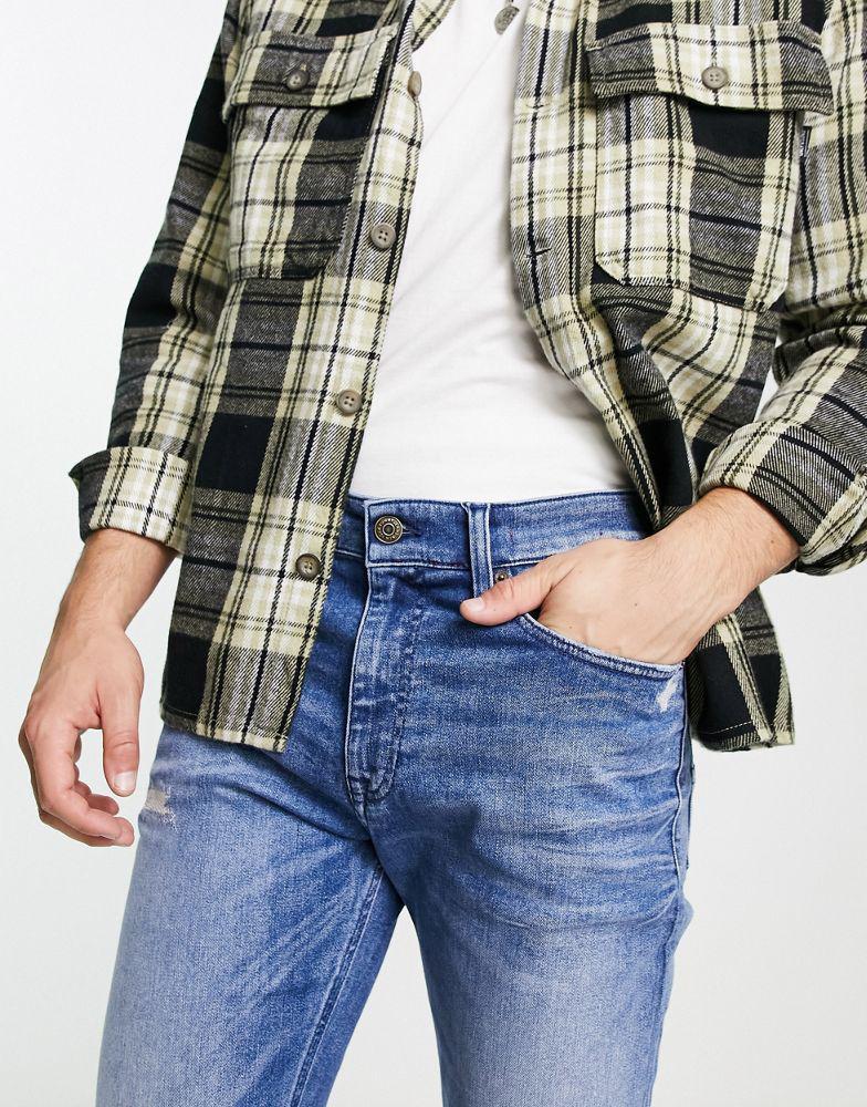 商品Tommy Jeans|Tommy Jeans simon skinny jean in mid wash,价格¥667,第4张图片详细描述