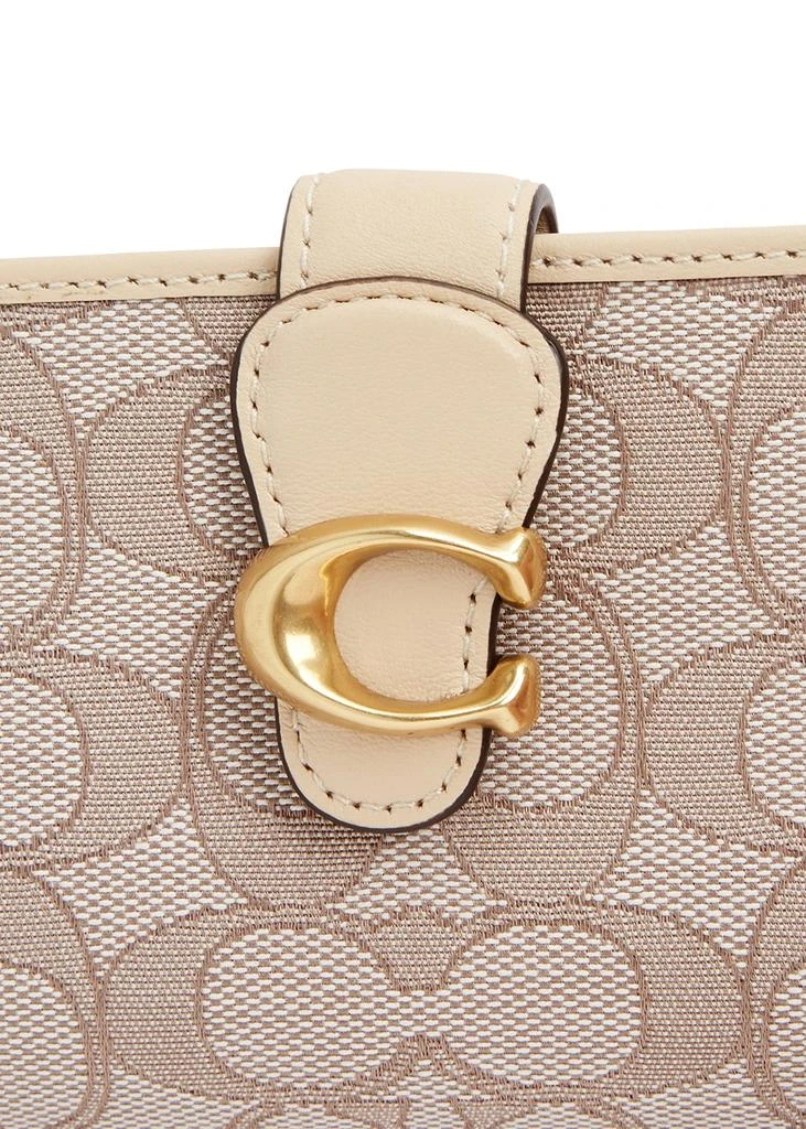 商品Coach|Tabby medium cream monogrammed wallet,价格¥1221,第3张图片详细描述