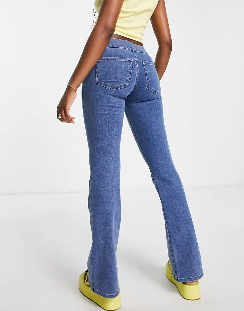 商品Topshop|Topshop low rise Joni flare jeans in mid blue,价格¥338,第2张图片详细描述
