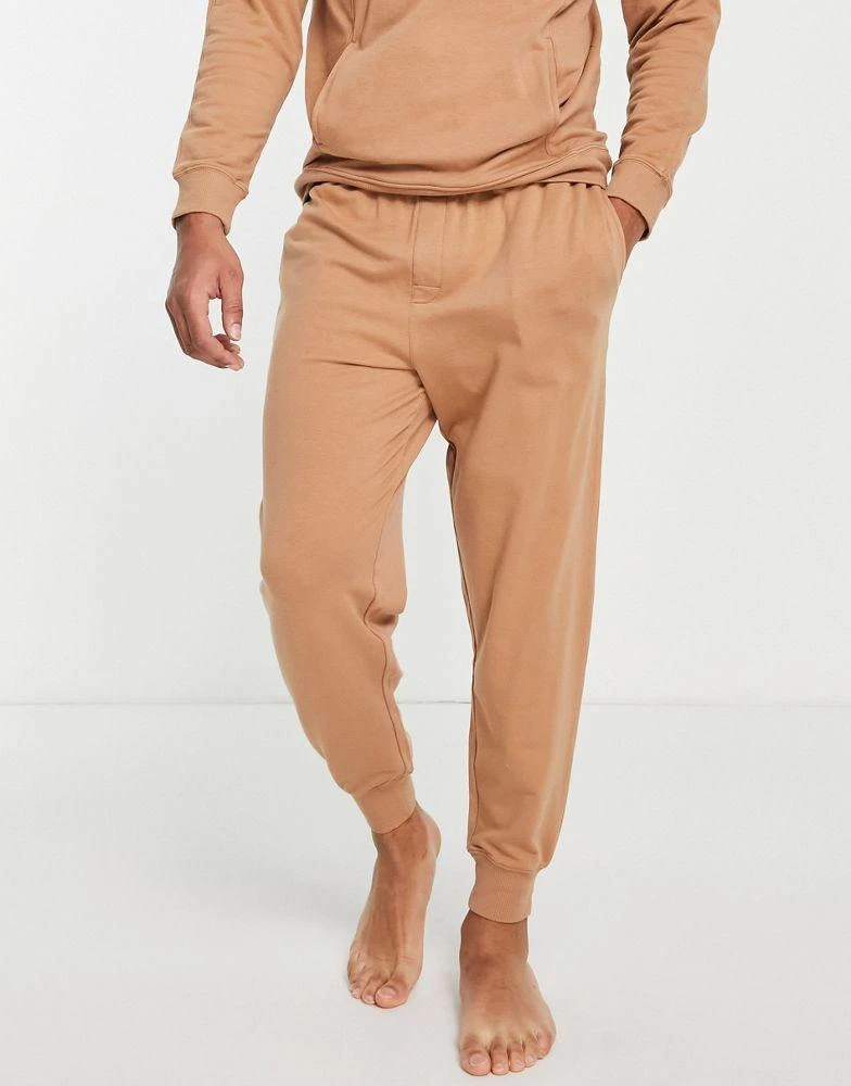 商品Calvin Klein|Calvin Klein contrast waistband lounge joggers in camel co-ord,价格¥441,第4张图片详细描述