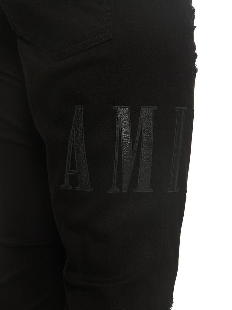 商品AMIRI|Leather Logo Cotton Denim Jeans,价格¥8701,第6张图片详细描述