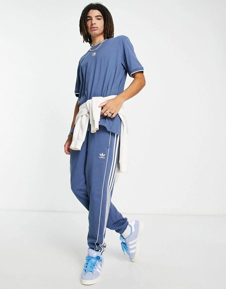 商品Adidas|adidas Originals Rekive three stripe t-shirt in blue,价格¥250,第3张图片详细描述