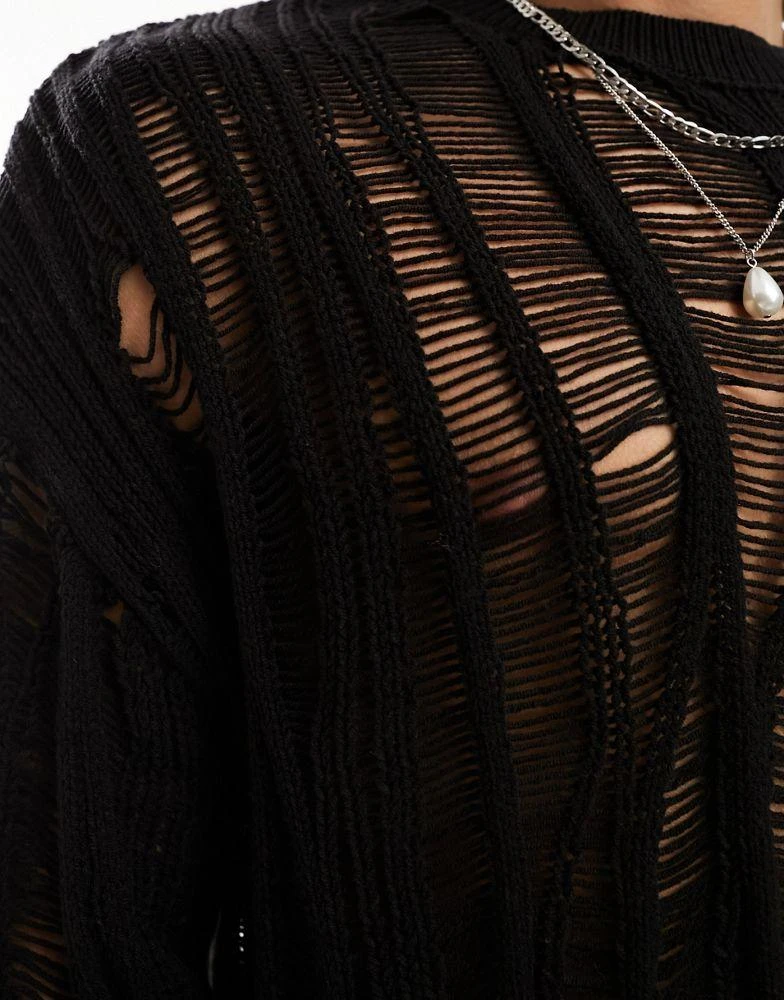 商品ASOS|ASOS DESIGN knitted oversized jumper with distressed ladder detail in black,价格¥181,第3张图片详细描述
