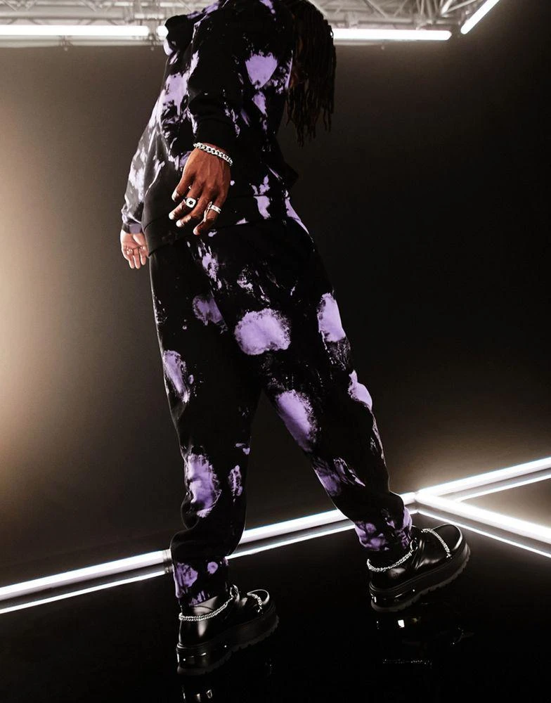 商品ASOS|ASOS DESIGN co-ord oversized joggers in black and purple tie dye with text print,价格¥180,第4张图片详细描述