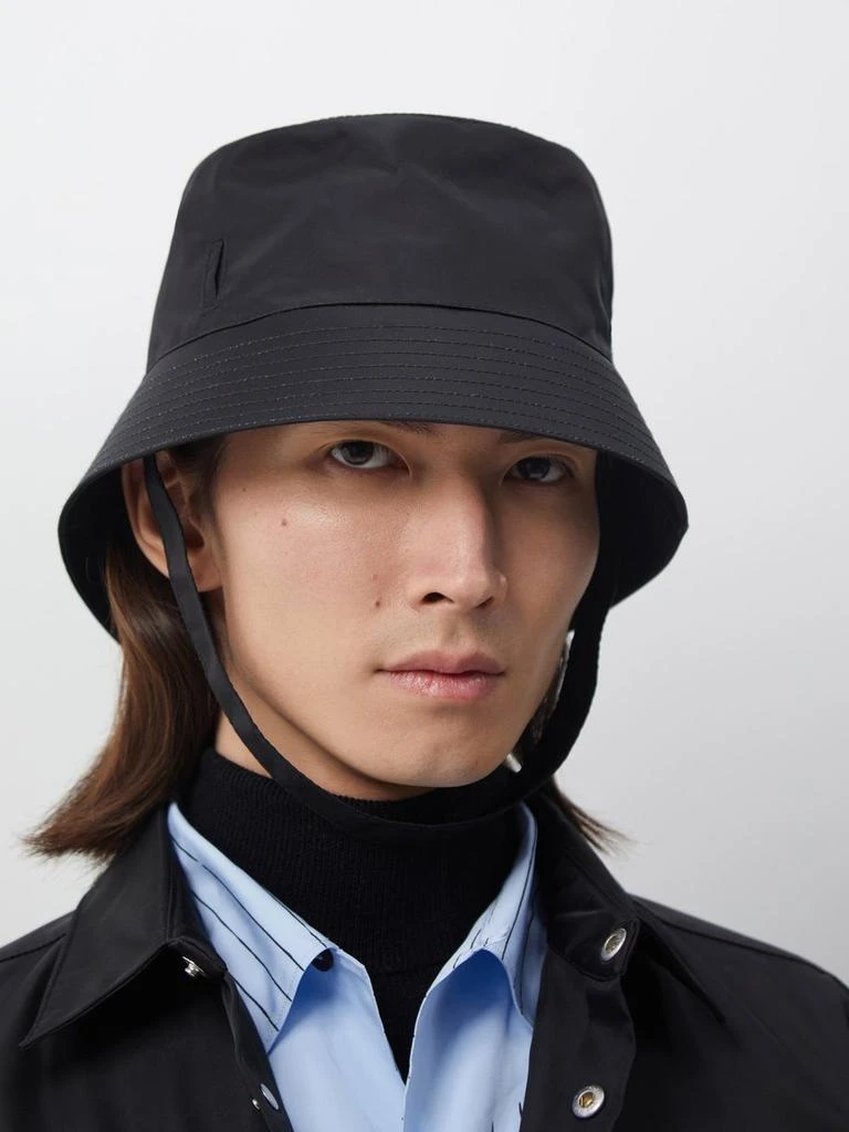 商品Prada|Triangle-logo zip-pouch nylon bucket hat,价格¥2242,第2张图片详细描述