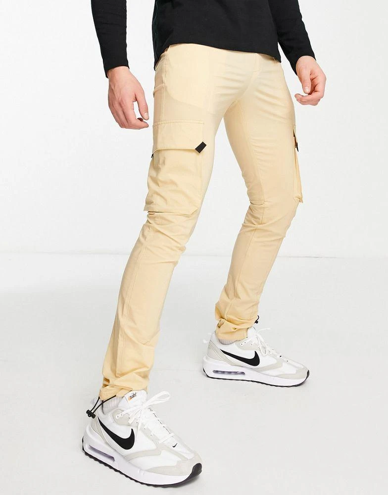 商品American Stitch|American Stitch stretch nylon cargo trousers in beige,价格¥273,第1张图片