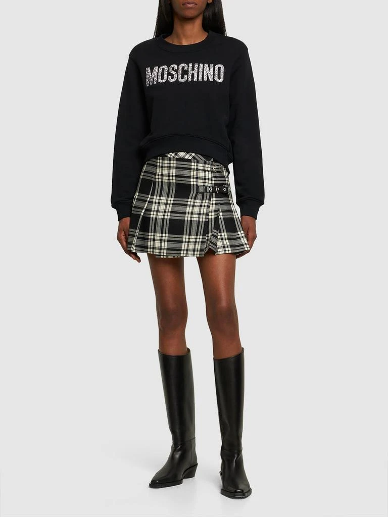 商品Moschino|Jersey Logo Long Sleeve Crop Sweatshirt,价格¥910,第1张图片详细描述