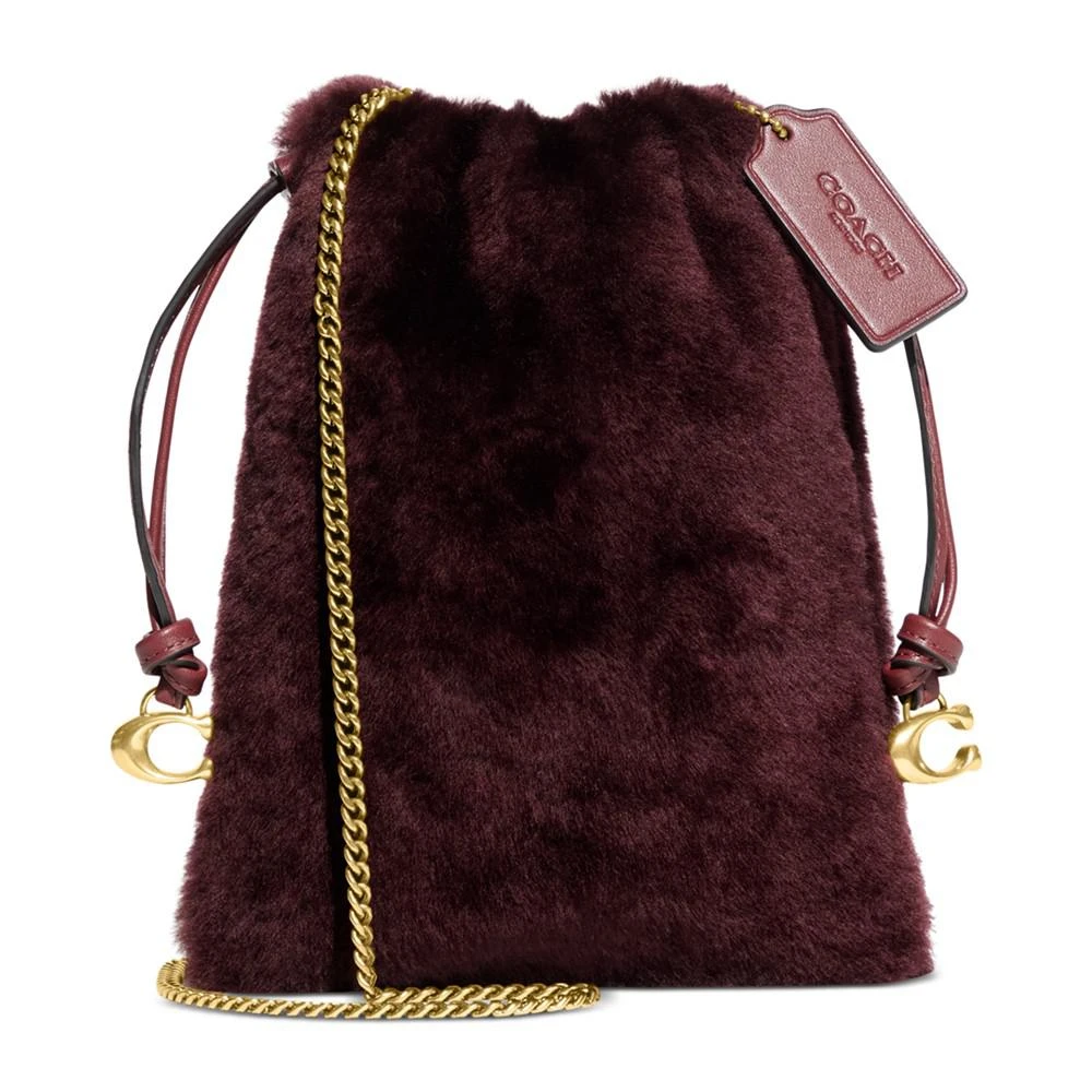 商品Coach|Shearling Drawstring Pouch,价格¥1127,第1张图片