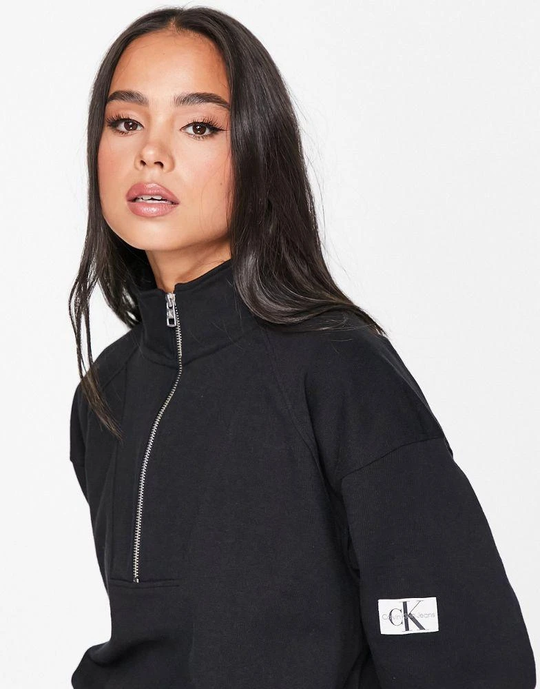 商品Calvin Klein|Calvin Klein Jeans cotton badge logo half zip sweatshirt in black - BLACK,价格¥801,第4张图片详细描述