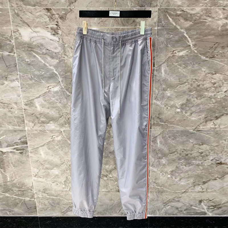 商品[国内直发] Thom Browne|Thom Browne 男士灰色运动裤 MJQ070A-03215-055,价格¥6284,第1张图片